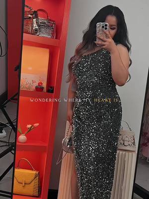 A post by @bagmaster_uk on TikTok caption: Fabulous Glittered Gowns Launched to our yellow shopping cart-Don’t forget to join Nezira’s live show to check this gown out #trendhunter#trendnews#gowns#tiktokmademebuyit#summersale#fyp#foryourpage