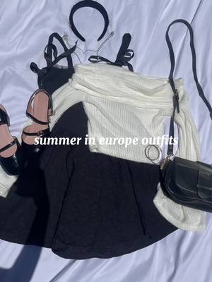 A post by @eliyanatachera on TikTok caption: i want to travel so badly #fashion #summerfashion #outfitinspo #vacationoutfits #summerineurope #summerineuropeoutfits #outfitideas #europeansummer #summeroutfit