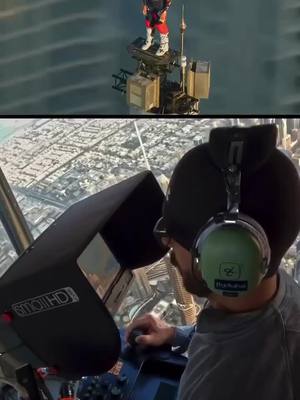 A post by @indiefilmmakers on TikTok caption: CRAZY! Would you rather be in the helicopter or on top of that building? 🤔 Behind the scenes with @gblaksley🚁🎥 in action. #FILMMAKING #FILMMAKER