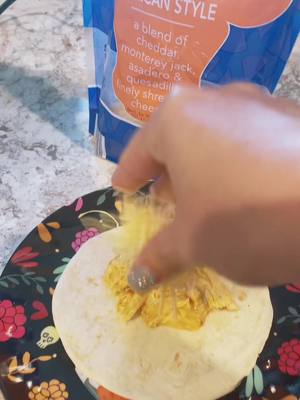 A post by @sciencemama on TikTok caption: Lazy Mama Cheesy Chicken Tacos. 2-3 chicken breast, 1 can of queso, 1 packet of taco seasoning, and tortillas. Cook for 3 hours in high (or 6 on low if you remembered to start dinner on time). Add more cheese as needed (always needed). Yummy! #tacotuesday #cookwithme 