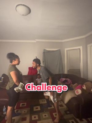 A post by @trillionairetre_ on TikTok caption: Idk why he stay trying to battle me 😂 #SockChallenge #CouplesChallenge #AaronandTre #TikTokChallenge #Chicago #Trevonia #Laughs #Fun