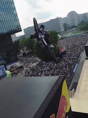 A post by @mtb__madness on TikTok caption: first flat drop cashroll landed in an event @davidgodziek #redbull #roofride #slopestyle