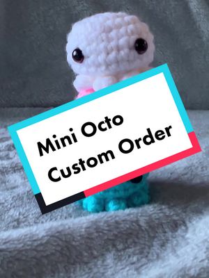 A post by @meandmygrandma09 on TikTok caption: Another custom order I’m the books! • I just love making these adorable mini octos and these colors are just perfect together 💗 • What your own custom set of mini octos? Just message me! • • • #10kartist #shopmeandmygrandma #crochettok #crochetoctopus #minioctopus