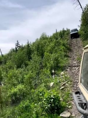 A post by @yyc4wheelers on TikTok caption: Oof! She was a little steep !🥵 . . @yyc4wheelers  . . #jeep #jeeplife #trails #wheeling #4x4 #offroad #builtnotbought #xjaddicts #xjbuilds #xj6 #xjcherokee #xj #cherokee #instagood #reels #reelsinstagram #tbt #reelsvideo #tiktok 