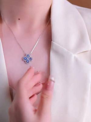 A post by @zhouyaogood on TikTok caption: #giftsfoher #initialsnecklace #jewelry #bohomoonjewellery #foryou #beautiful