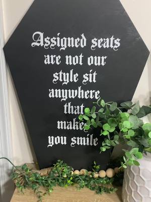 A post by @katiesdecosweets on TikTok caption: Two coffin signs done for a customer 🖤 Katiesdecosweets.Etsy.com  #coffinsign #coffin #weddingsign #weddingsigns #assignedseating #tablechart #tableseatingchart #customweddingsign #weddinginspiration #weddingideas #halloweenwedding #gothwedding #cricutmade #handmadesign #sunnyskies #madeinmaryland 