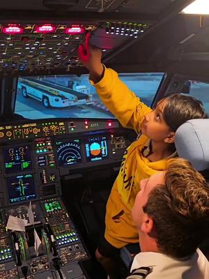 A post by @u_time on TikTok caption: Zayden chilling with the pilot and gets tricked.  #airplane  #coolkids  #pilot  #fly  #fyp 