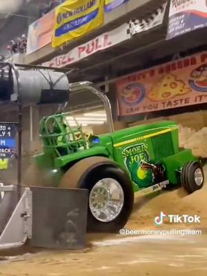 A post by @smokinjoe33 on TikTok caption: throw back to Keystones indoor pull wrecking that beach#sledpulling #forthefarmers #promotepulling365 #foryou #johndeere #beermoneypulingteam #fyp @beermoneypullingteam