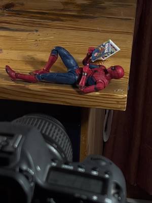 A post by @fatbirdthings on TikTok caption: I love reading, it doesn’t matter what exactly #stopmotion #spiderman #marvel #acrossthespiderverse 