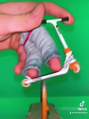 A post by @miniskatebo on TikTok caption: Play with me#play#skateboard #fyp#fingers #fingerdance