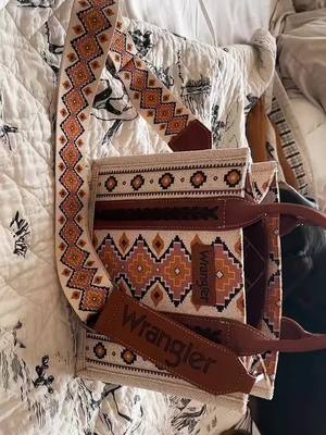 A post by @sierraprange15 on TikTok caption: In love with this☺️😍 #wranglerpurse #amazonfinds #westernfashion 