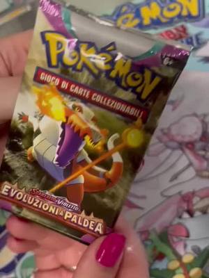 A post by @paninotech5 on TikTok caption: #pokemon #pokemonevoluzioniapaldea #spacchettamento #pokemoncards