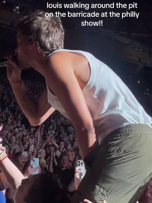 A post by @mercadeswatt on TikTok caption: i got to (very softly) touch louis three times thursday, during this video is one of those times. he was amazing as usual. made it a  perfect night! i love him so much, so happy i got barricade for this show and the where do broken hearts go lyrics sheet at the end. ill never forget this. #louistomlinson #onedirection #faithinthefuture #fitf #faithinthefutureworldtour #fitfphilly #faithinthefuturephilly #backtoyou #philly @lthqofficial 