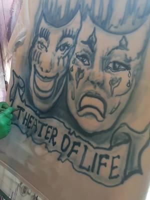 A post by @mayukmanuel on TikTok caption: My partner airbrushing my son an airbrush t-shirt Theater of Life.  My son is a theater actor. #tragedy #comedy #theatertiktok