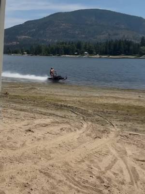 A post by @ripper_208 on TikTok caption: The ol wedge chassis pushing 64 mph skipping water! #ione #waterskip #summersucks #sledtok #snowmobile #snowmobilevideos #polaris #tripple #2stroke #2smoke #oldiorn