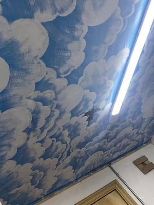 A post by @idenisha on TikTok caption: Painting is literally my life on this deployment 🥰 what y’all think about this project? #militarytiktok #ceilingmural #skypainting #Lifestyle #viral #fyp