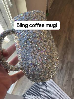 A post by @aweinspiredcrafts on TikTok caption: Who needs this mug in their lives? #DIY #bling #blingedmug #tumblersofig #tumblers #blingedout #fancy #handmade 