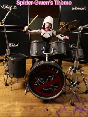 A post by @fatbirdthings on TikTok caption: #spidergwen #spiderman #gwenstacyspiderverse #gwenstacy #spidermanacrossthespiderverse #stopmotion #drums 