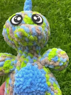 A post by @blinginbowtique on TikTok caption: Available now in etsy, this cute dino buddy #crochet #crochetersoftiktok #bow #handmade #crocheter 