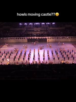 A post by @marching.things on TikTok caption: these japanese marching bands are different man #japan #howlsmovingcastle #band #dci #marchingband #anime #drumcorps #marchingthings #studioghibli #merrygoroundoflife 