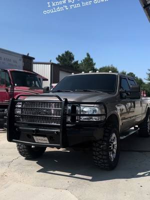 A post by @bradley7three on TikTok caption: 7.3 problems 🐢 she slow #7three #powerstroke #superduty #grappaholics #nitto #ranchhand