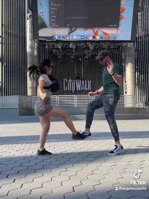 A post by @angelalalala96 on TikTok caption: Take 827 🎬 #fyp #universalstudioshollywood #citywalk #handshake 