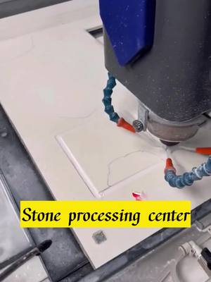 A post by @hongyuntilecutter on TikTok caption: Stone processing center processing square basin holes.#machinecnc #stonemachinery #stonecuttingmachine #cncstonemachine #stoneprocessing #machiningcenterprocessing 