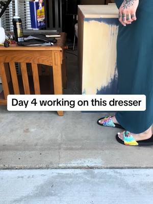 A post by @annamariemk on TikTok caption: The heat is slowing me down!! Its been feeling like 116 out. #refurbishingfurniture #goodwillfinds❤️❤️❤️ #hobby #refurbishmentprojects