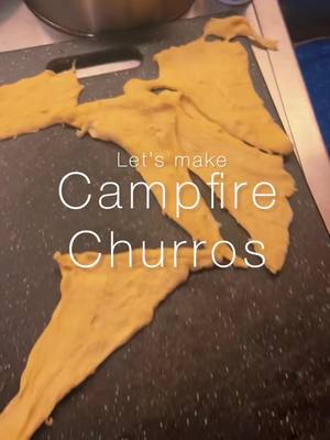 A post by @vibewithnaiiiii on TikTok caption: Watch how i made some campfire churros this weekend 🏕️❤️ . . . . . #campfiresnacks #campfiredessert #getawaycabin #fyp #foryourpage #foryoupage #nyccontentcreator #camping #contentcreator #howtomake #letsmake