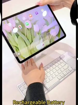 A post by @ivy_null on TikTok caption: Bluetooth wiress keyboard #fypシ #funny #tikyokmademebuyit #computer 