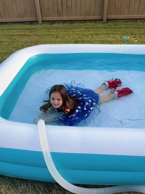 A post by @ashleymckenzie on TikTok caption: She wanted to fly like Wonder Woman. 🦸🏼‍♀️  #wonderwoman #swim #swimmingpool #kidsoftiktokfunny #silly #sillygoose #fy #fyp #fypシ #flying #jumping