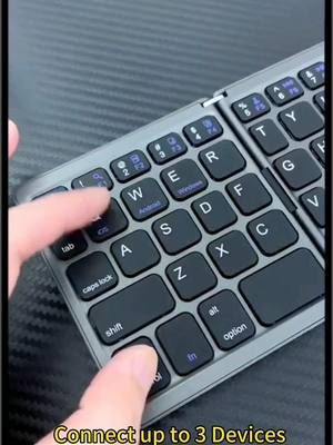 A post by @ivy_null on TikTok caption: folder wireless charger keyboard #computer #tikyokmademebuyit #funny #fypシ #goviral 