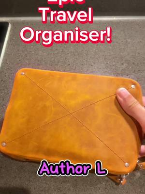 A post by @carmerchant on TikTok caption: Link to their site in my Linktree! #leather #edc #travel #organiser 