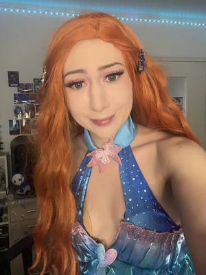 A post by @roselhia_ on TikTok caption: ⚠️fake body ⚠️  Inst: Roselhia  #bloom #winxclub #winxcosplay #bloomenchantixcosplay #bloomenchantix