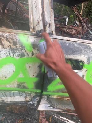 A post by @loftysforthepeople on TikTok caption: Quick ones with these burned downed  cars! #graf #graff #graffiti #graffitiart #graffitibombing #graffititag #graffititagging #graffitiforyou #graffitimansion #tagging #graffitiletters #grafftagging #grafftok #graffitiartist 