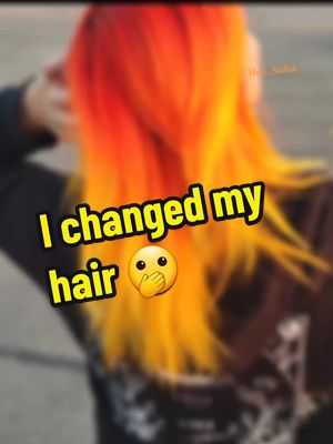 A post by @hail_sadist on TikTok caption: I decided it was time for a little change. 😍 #orangehair #orangeandyellow #orangeandyellowhair #yellowhair #newhair #chichroma #hair #hairdye #paramorehair #funhair #emo #livingmybestlife #hairtok 