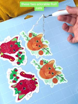 A post by @zt.draws on TikTok caption: which cat would you choose?! 🍊🍓💖 #fruitcore #fruitcatstickers #stickerclub #magnetclub #catcore #cutecatstickers 