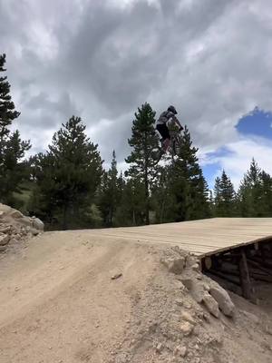 A post by @biking_4_life on TikTok caption: 53 feet 🥶🥶 #mtb #trestlebikpark #fypシ #foryoupage #foryou #viral #blowthisup #skills #bikes #dirtbikegirl