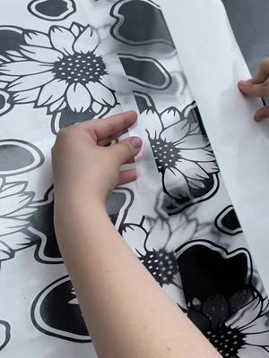 A post by @flintzprintz on TikTok caption: #decals #sunfliwers #cowprint