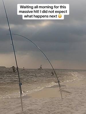 A post by @salt_squatch on TikTok caption: Massive hit on the surf fishing rod! #fishingtiktoks #surffishing #fyp 