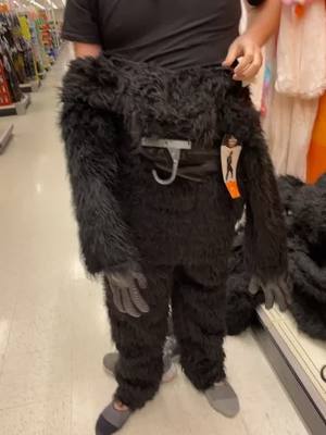 A post by @danimal_mayhem on TikTok caption: Its the guy’s reaction behind me, for me… #target #halloween #gorilla #awkward 