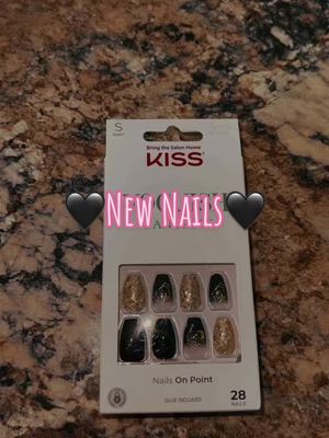 A post by @patience_riley on TikTok caption: New Nails 💅🏻🖤 #nailtransition #nailsathome #nailcheck #newnails #kissnails #voguishfantasy #nailsonpoint #nailtok #girlytok #blackandgold #spookyvibes #fyp