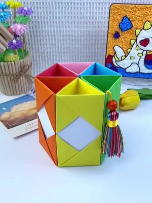 A post by @aaronlikehandcraft on TikTok caption: Papaercraft pen container. #foryou #fyp #DIY #handcraft #handmade #tiktok #papercraft 