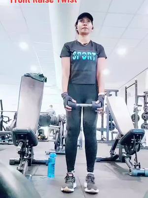 A post by @rajifitgirl on TikTok caption: Shoulder workout -Front raise twist -4 sets of 10 reps. This is an effective combo to sculpt your shoulders  #personaltrainer #fitnesscoach #personaltraining  #fitnessprogram #weightloss #bootcamp #bodytransformation #fitgirlsinspire