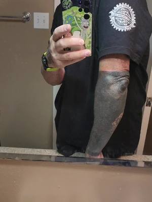 A post by @goodman.b_rc on TikTok caption: little more on the blackout 3/4 sleeve. #dadmoves❤️ #autismawareness #rcoutlaws @Tatted_Leona