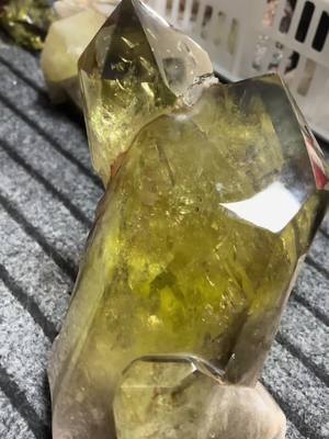 A post by @shopluckycrystal on TikTok caption: Natural citrine smoky clear raw point from Brazil#fyp #crystals #specimen #citrine 