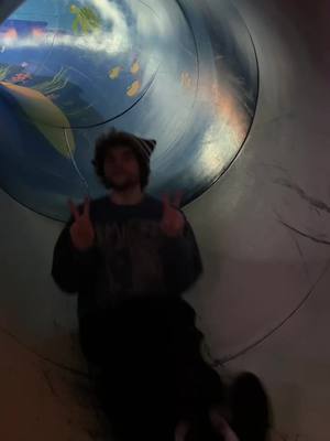 A post by @dreamwastakenwastaken on TikTok caption: A SLIDE in a bar??? texas is crazy