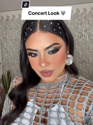 A post by @kathiamarie6 on TikTok caption: End result 🩶🩶 #bichotaseason #karolgconcertmakeup #grwm 