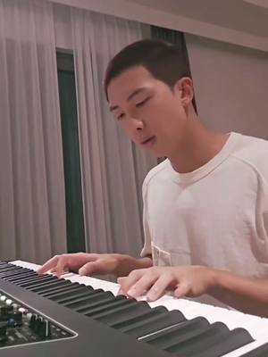 A post by @mikrokosjoon on TikTok caption: NAMJOON ON THE PIANO???? #namjoon #rm #bts #kpop #kpopfyp #foryou #fyp