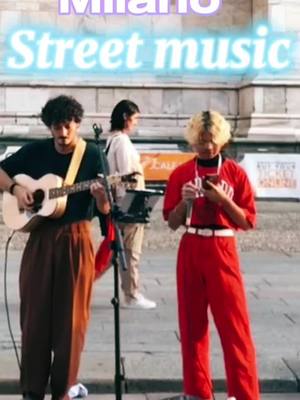 A post by @bluepower077 on TikTok caption: #fypシ #viral #streetmusic #guitar #italy #milan @Planet of Fun 